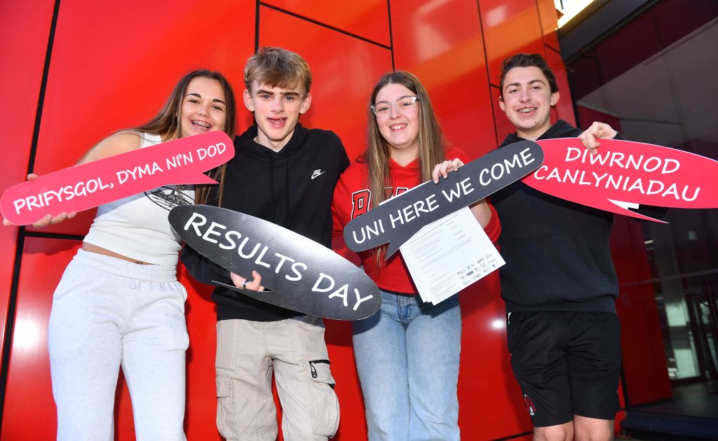 NPTC Group of Colleges students on Results Day with certificated and speech bubbles.